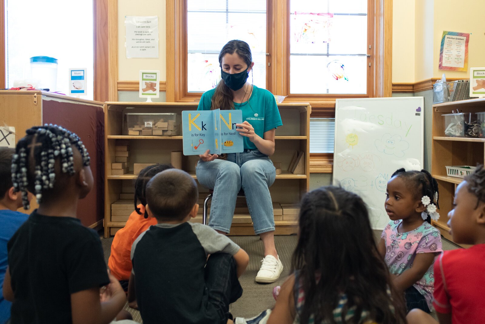 Miss Nielson reads to her class during her 3-5 year old class at Children's Village, 6613 S. Anthony.