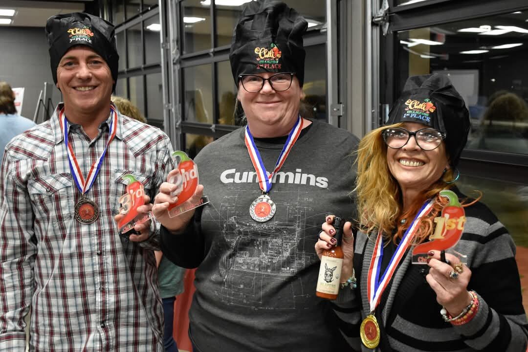Hamilton neighborhood residents at a chili cookoff-themed event.