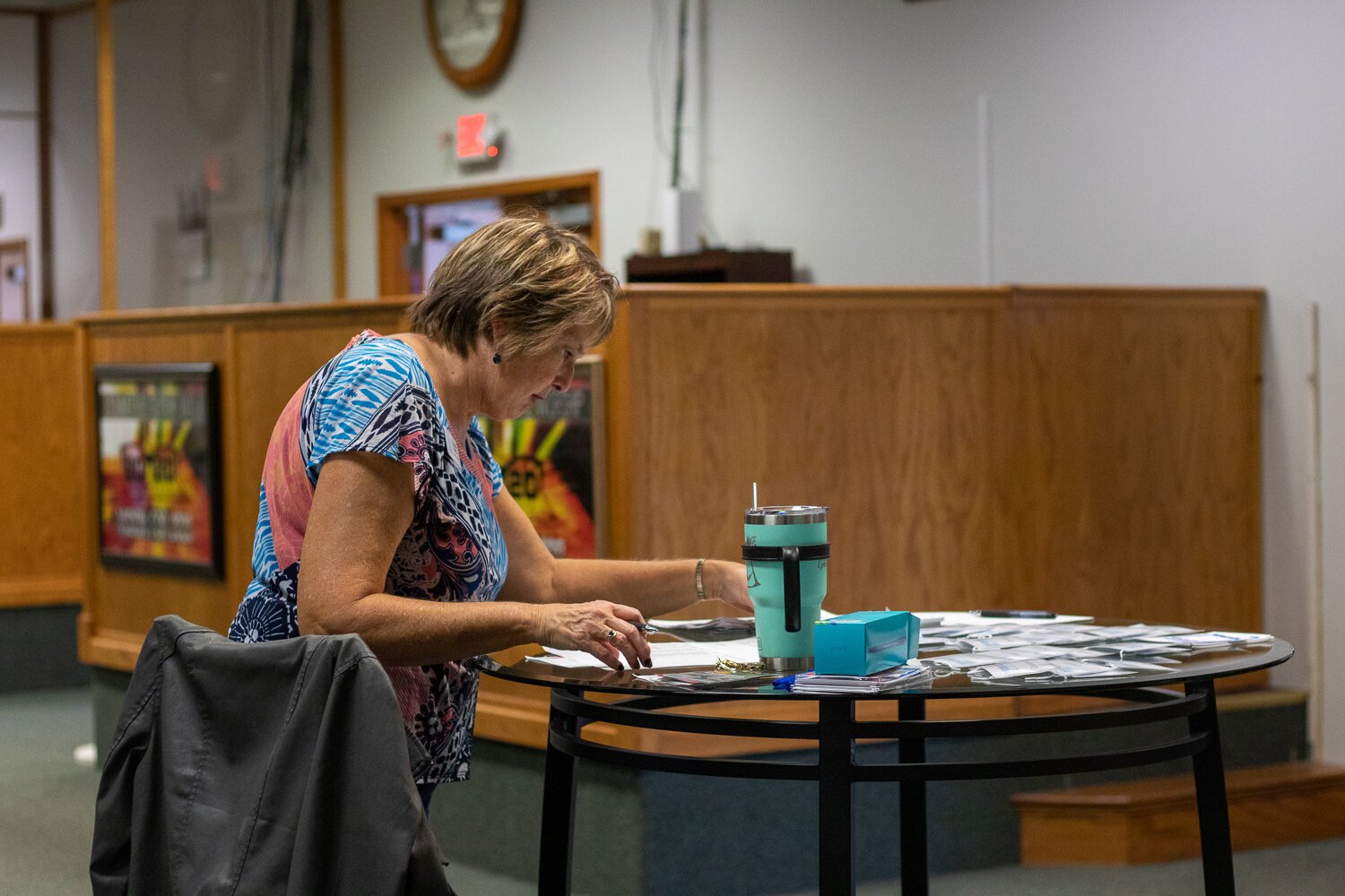 Debbie Smith, Assistant Director of Circles of Allen County, prepares to check in attendees at the first meeting.