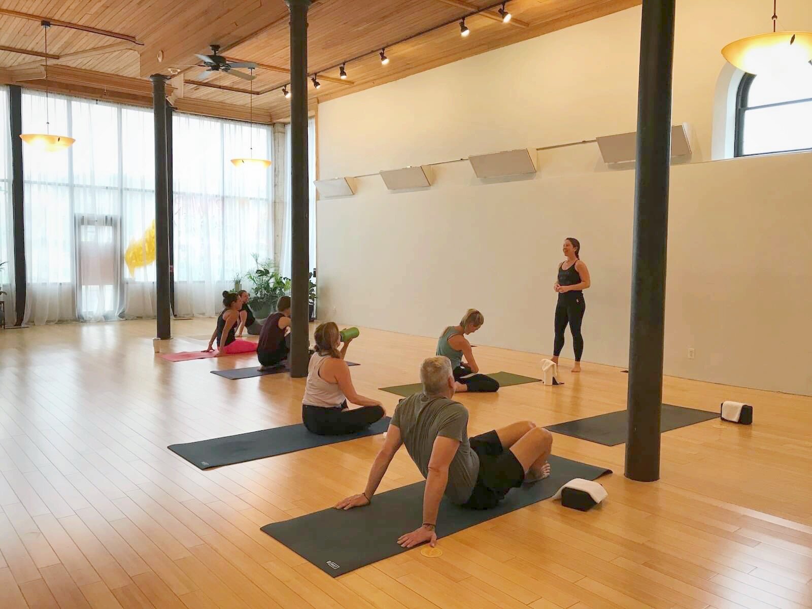 Co-Owner Sarah Evans leads a class at Baptiste Power Yoga Fort Wayne.
