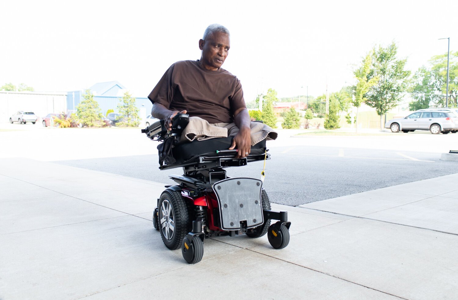 Alfred Woods uses the wheelchair ramp in front of Turnstone.