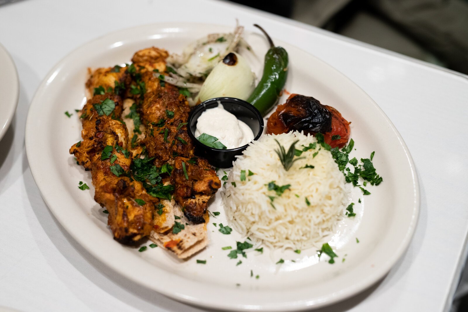 The Chicken Shish Kebab is juicy, salty, slightly tangy, and also rich in spices, with hints of grassy notes from the parsley sprinkled on top. Paired with the Chicken Shish Kebab is a garlic sauce that’s popular in Middle Eastern and Mediterranean r