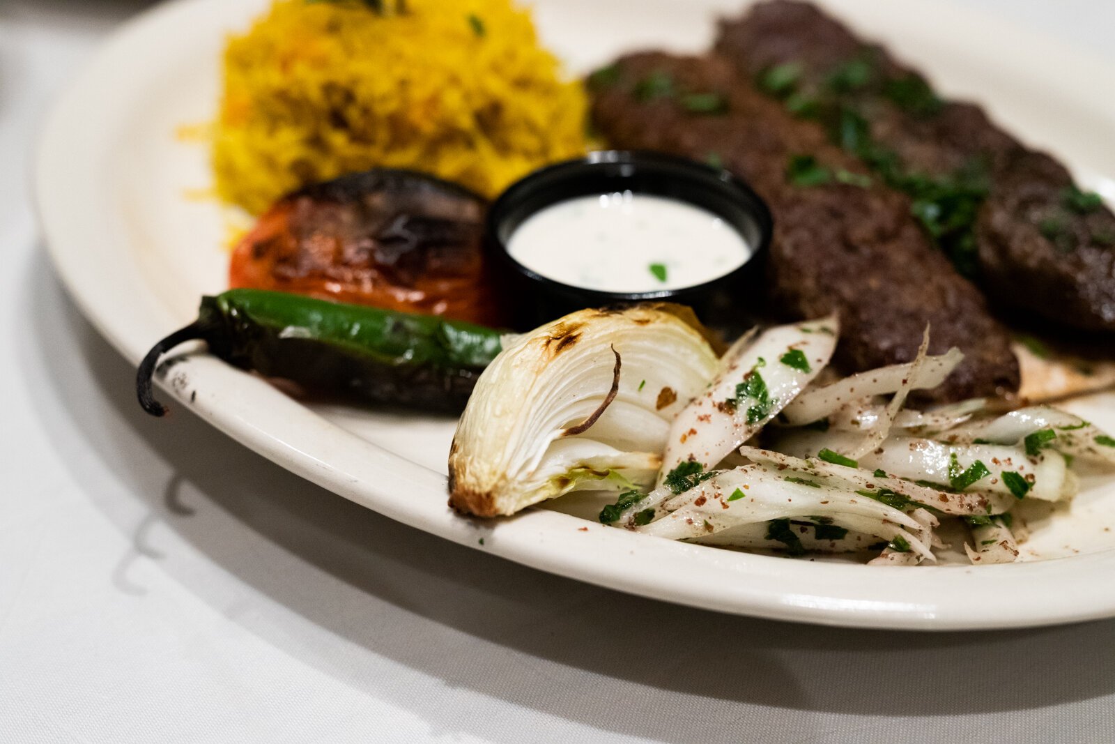 The Adana Beef Kebab is incredibly savory, tender, and well-spiced. It plays nicely with the nutty, slightly bitter tahini sauce it’s served with.