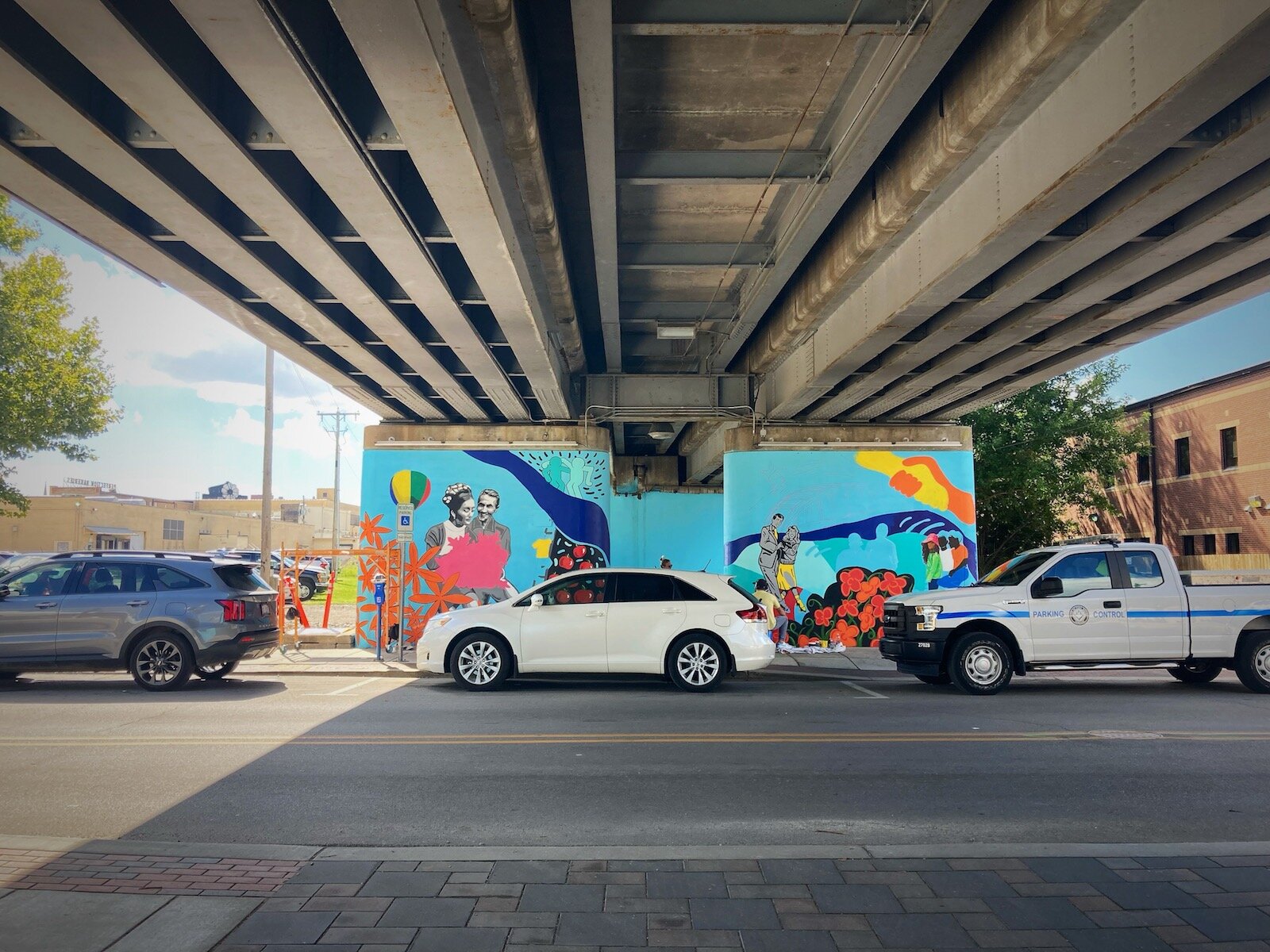 There's parking under the railroad overpass only steps away from The Landing near Harrison and Dock streets.