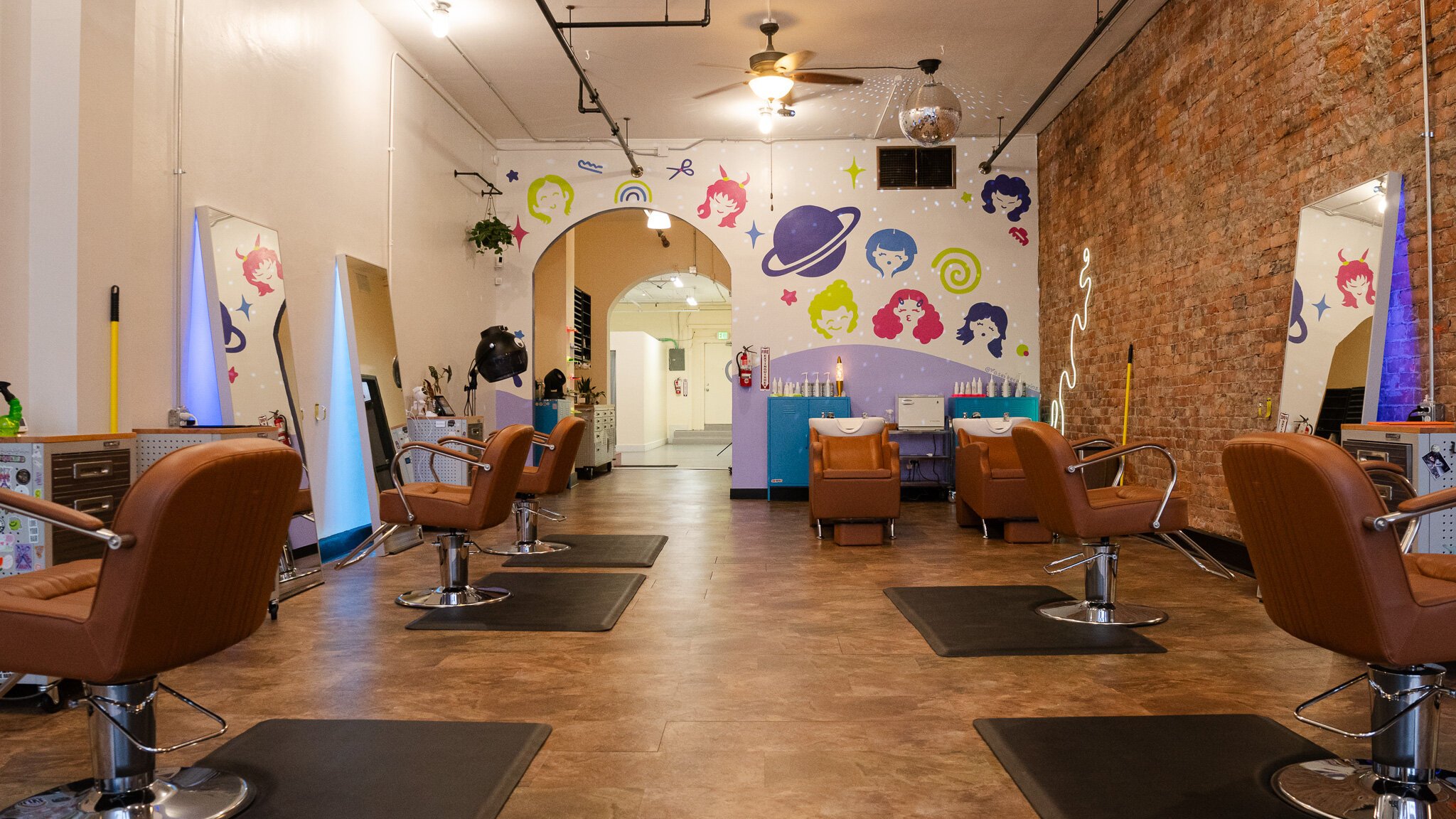 The Space Salon owner Olive refers to the salon's decor style as "space disco."