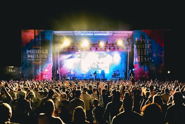 The St. Marys Stage at Middle Waves Music Festival comes alive at night.