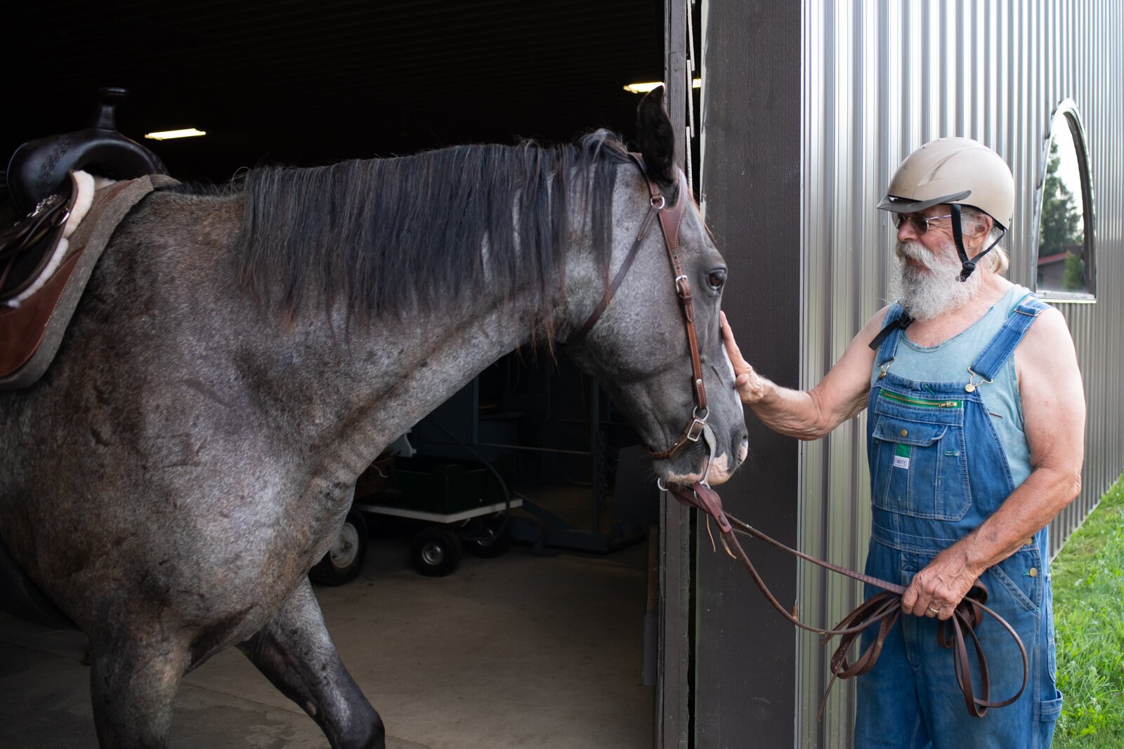 Veteran Randal Clemens with horse Mojo at Summit Equestrian Center, 10808 La Cabreah Ln.