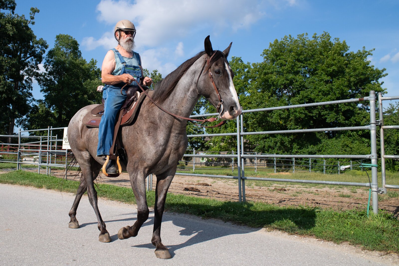 Allison Wheaton rides horse Belle and veteran Randal Clemens rides horse Mojo at Summit Equestrian Center, 10808 La Cabreah Ln.