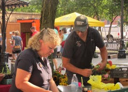 “Farmer Dan” Flotow and his wife, Wendy, have a booth at the YLNI Farmers Market in Fort Wayne.