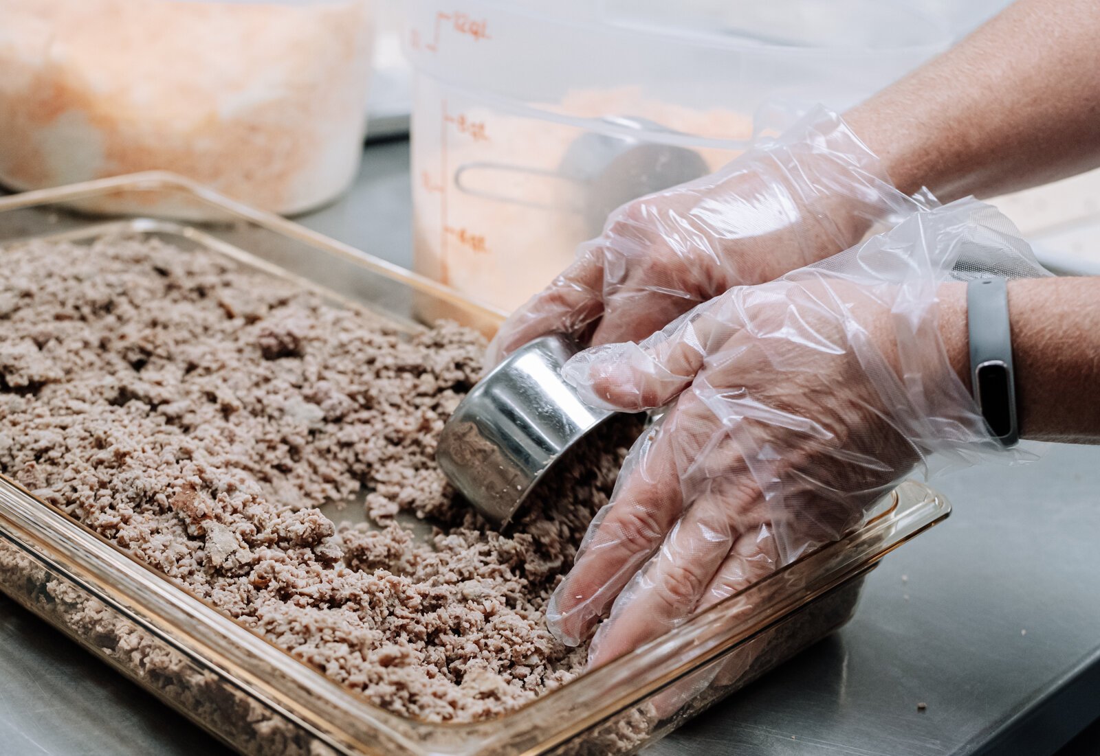 Landes's staff prepares sausage bread for lunch at Manchester Junior-Senior High School with local pork from 4-H.