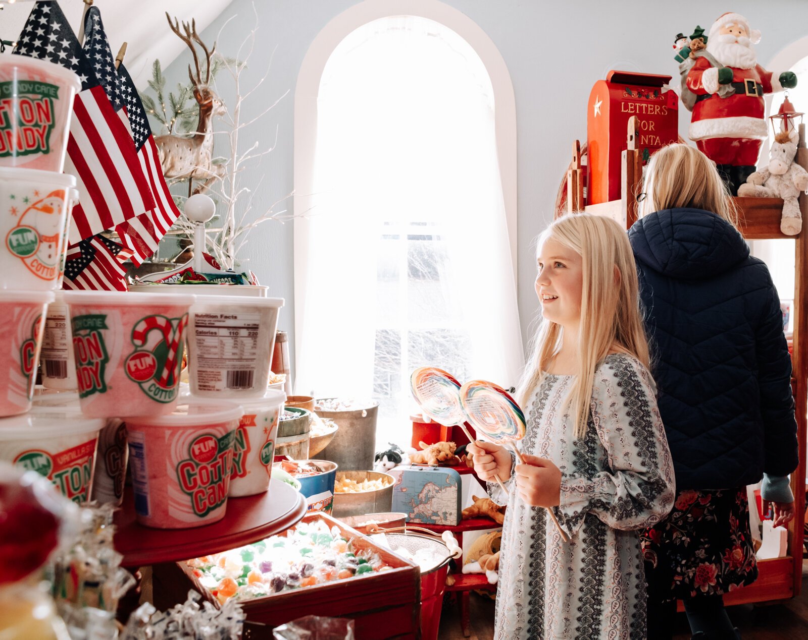 Finley Wretling, 9, looks for presents for friends and parents at Spoonful of Sugar in Roanoke.