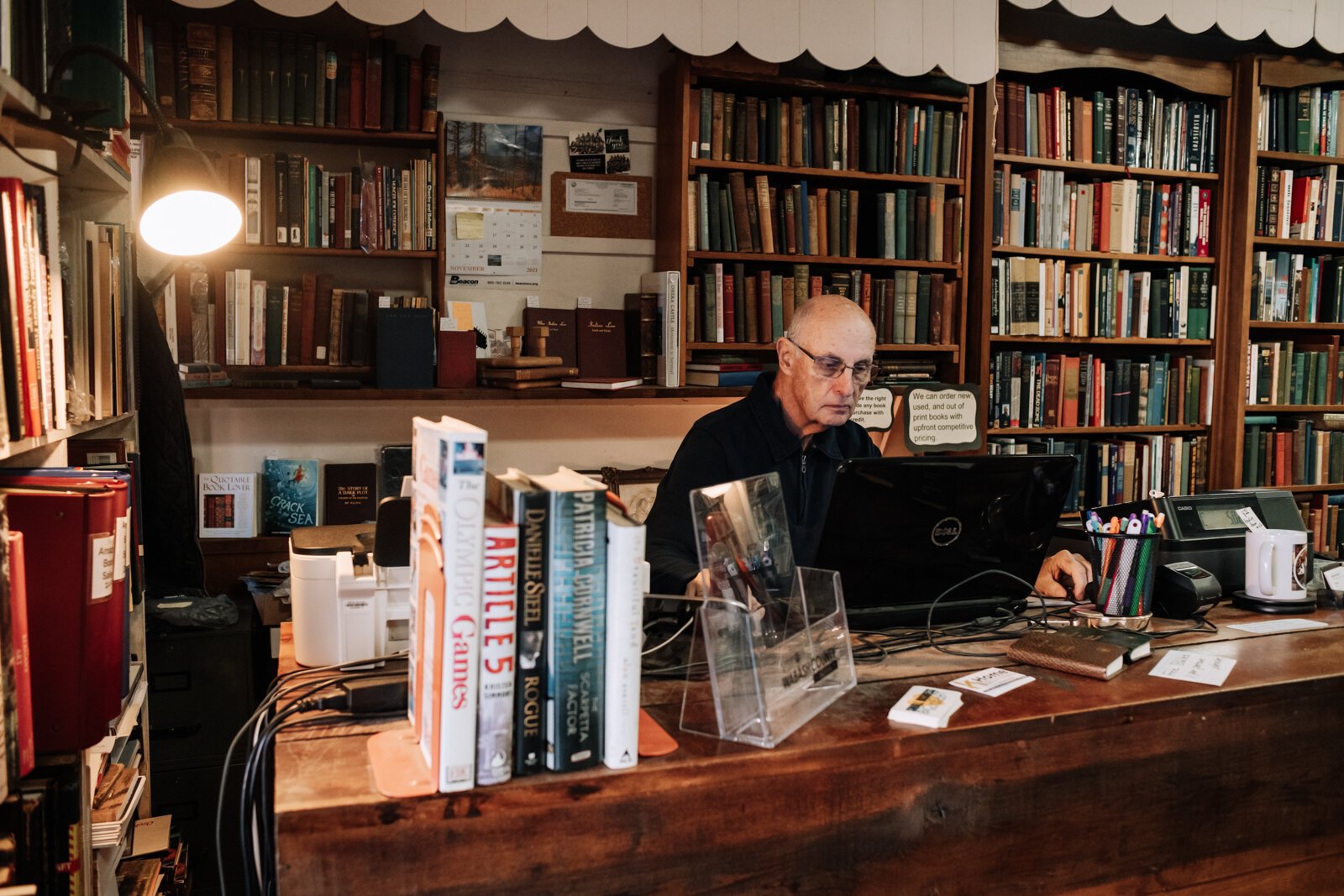 Manager Ray Daniels works the counter at Reading Room Books at 264 S. Wabash St. in Wabash.