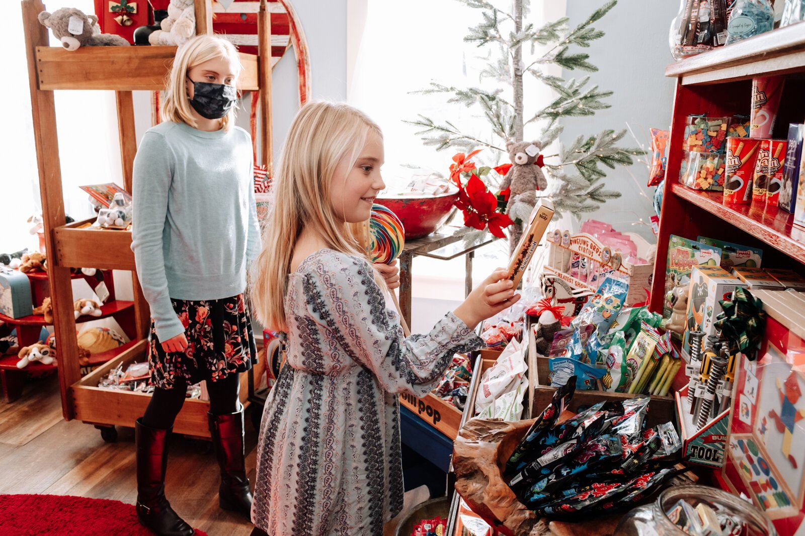  Finley Wretling, 9, looks for presents for friends and parents at Spoonful of Sugar in Roanoke.