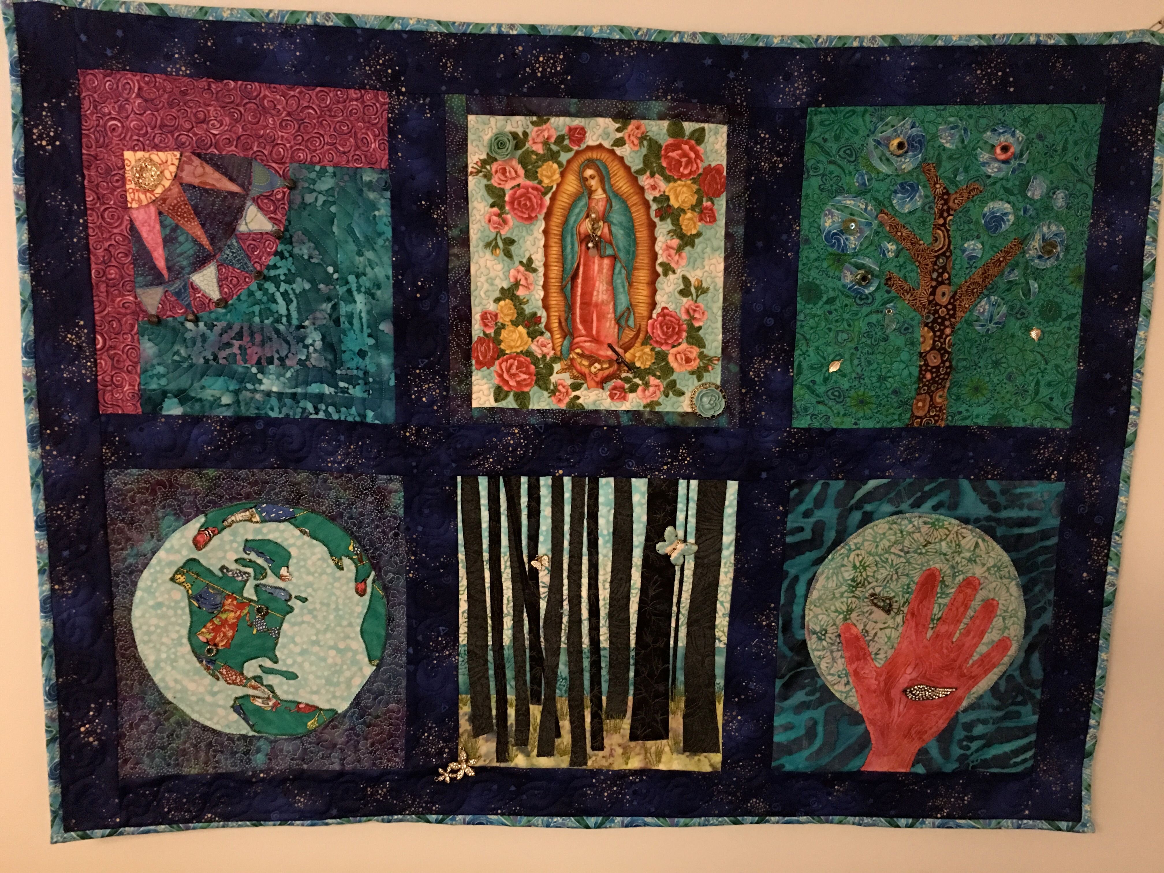 A quilted wall hanging made by Christine Paul.