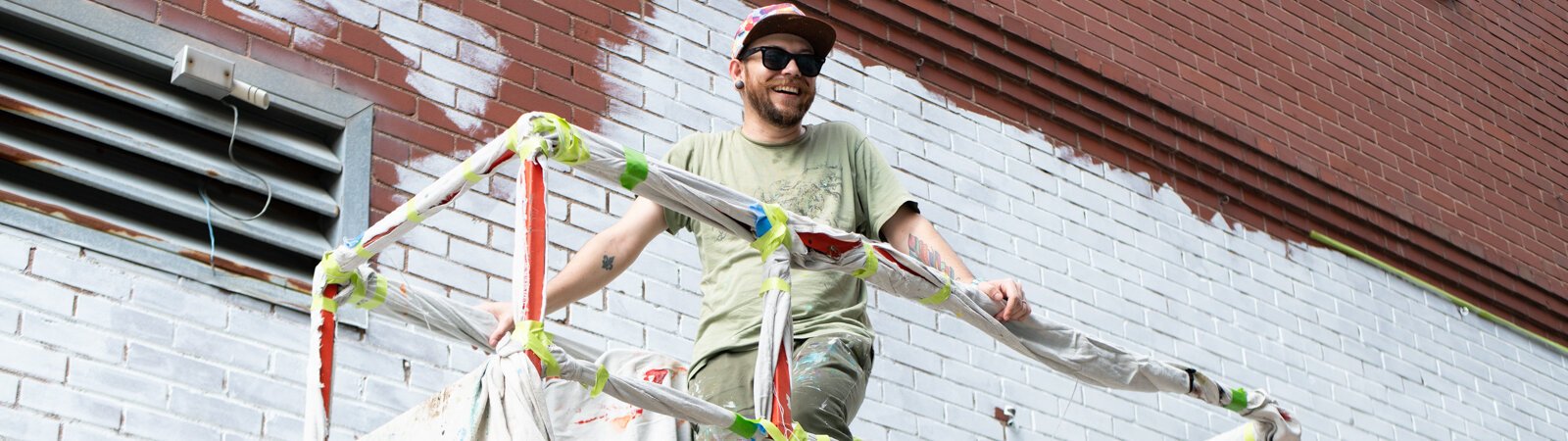 World-famous muralist Arlin Graff begins his mural on the Shindigz building at 919 South Harrison St. in Downtown Fort Wayne.