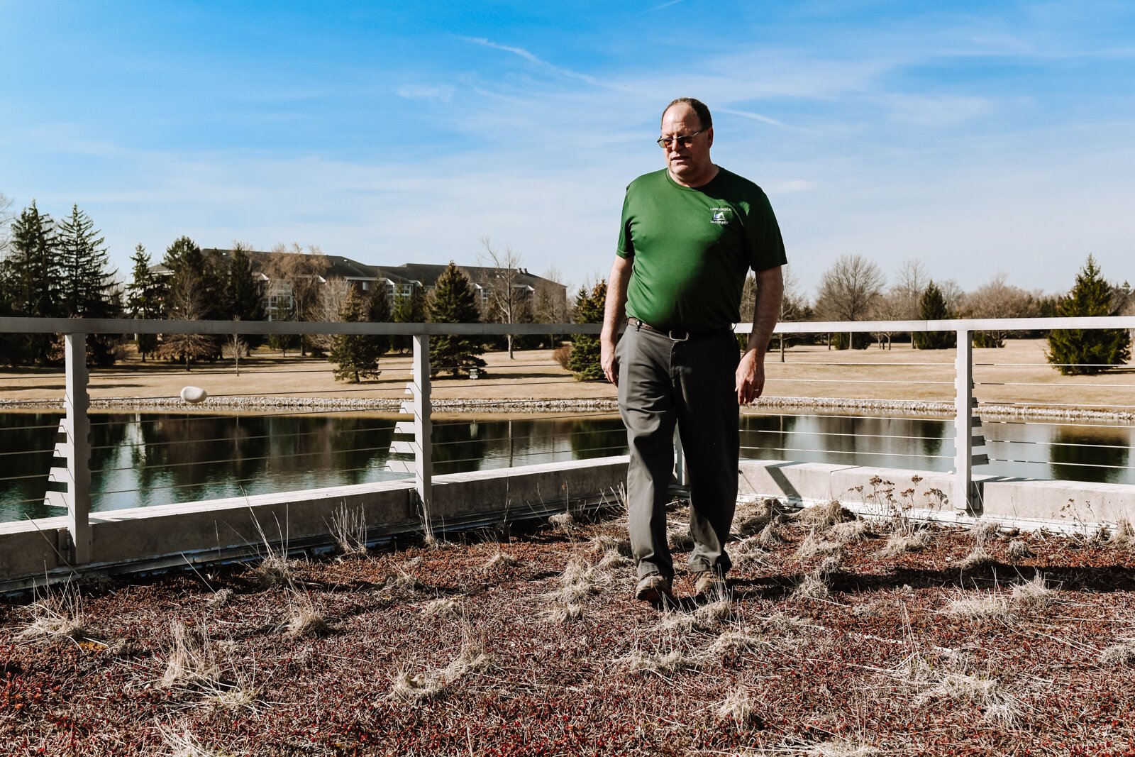 Grounds Manager Dennis Mertz maintains the green "living" roof (during the cold season) atop the campus library at Concordia Theological Seminary (CTSFW) at 6600 N. Clinton St.