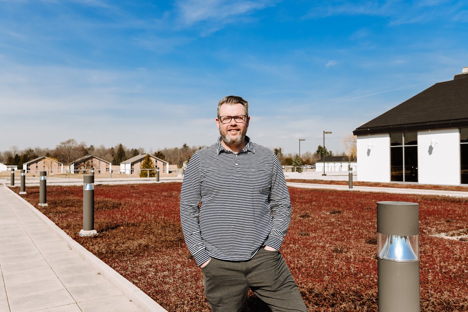 Deputy Director of Planning and Development at Fort Wayne Parks and Recreation Alec Johnson stands atop the green "living" roof at Concordia Theological Seminary (CTSFW) at 6600 N. Clinton St.