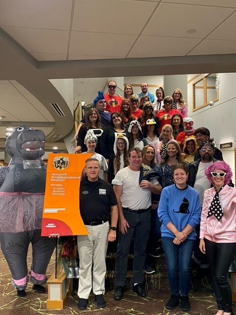 Honeywell team members gather for a photo at the annual Halloween Costume Party.
