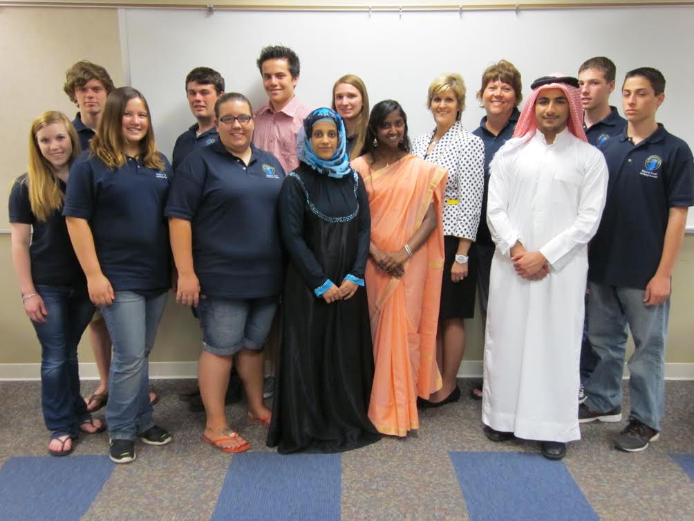 Students on Mayor Handshoe's Youth Engagement Council celebrate an international festival.