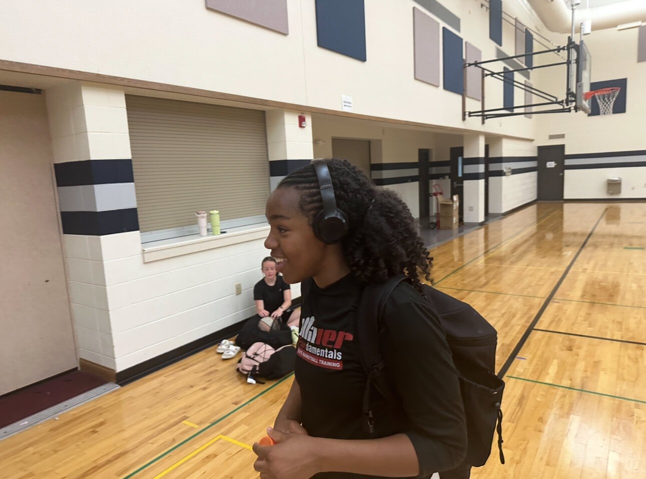 Harvest Green, 14, plays for the Nike Lady Gym Rats and is coached by Miller.