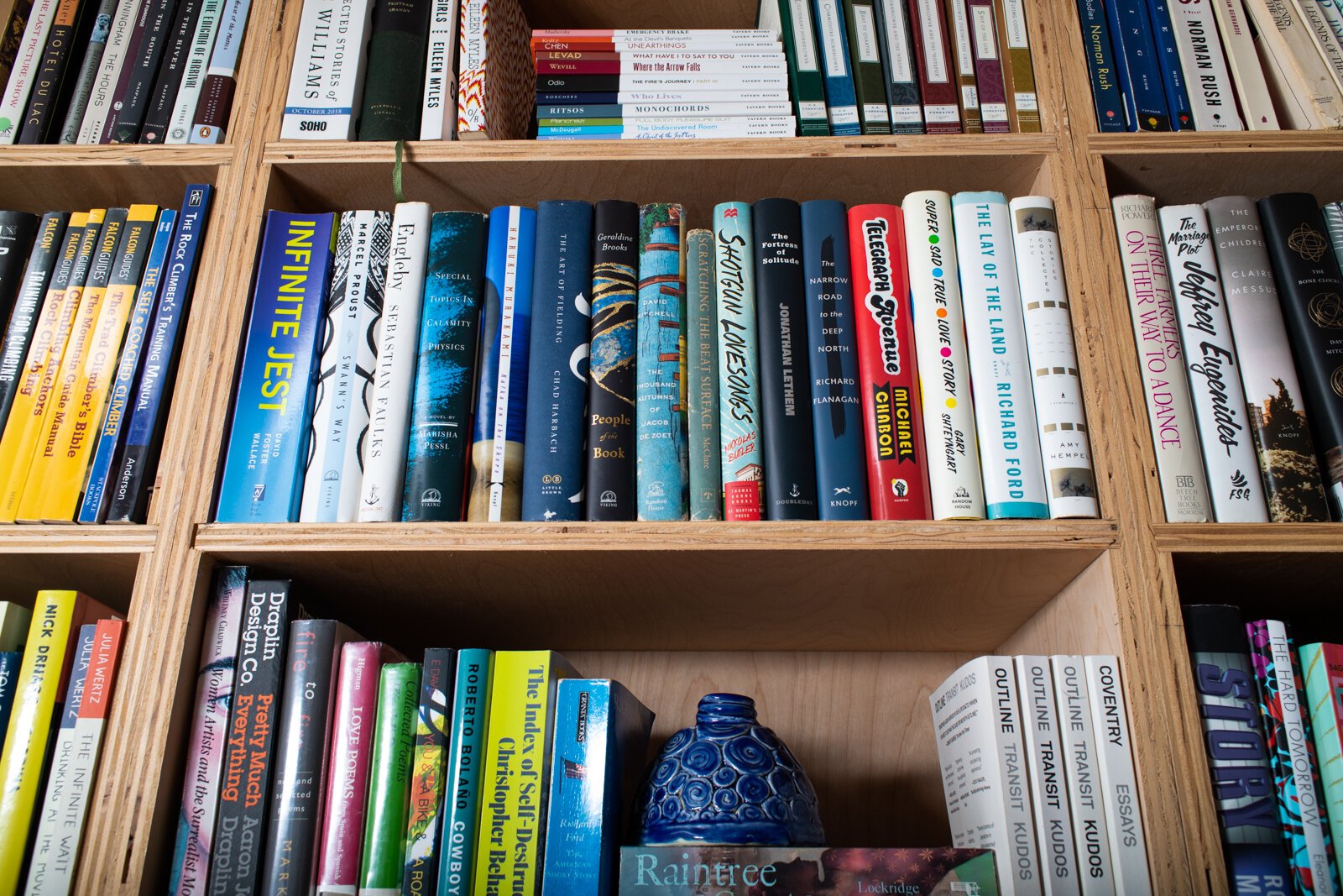 Books line the shelves at the Hill house.