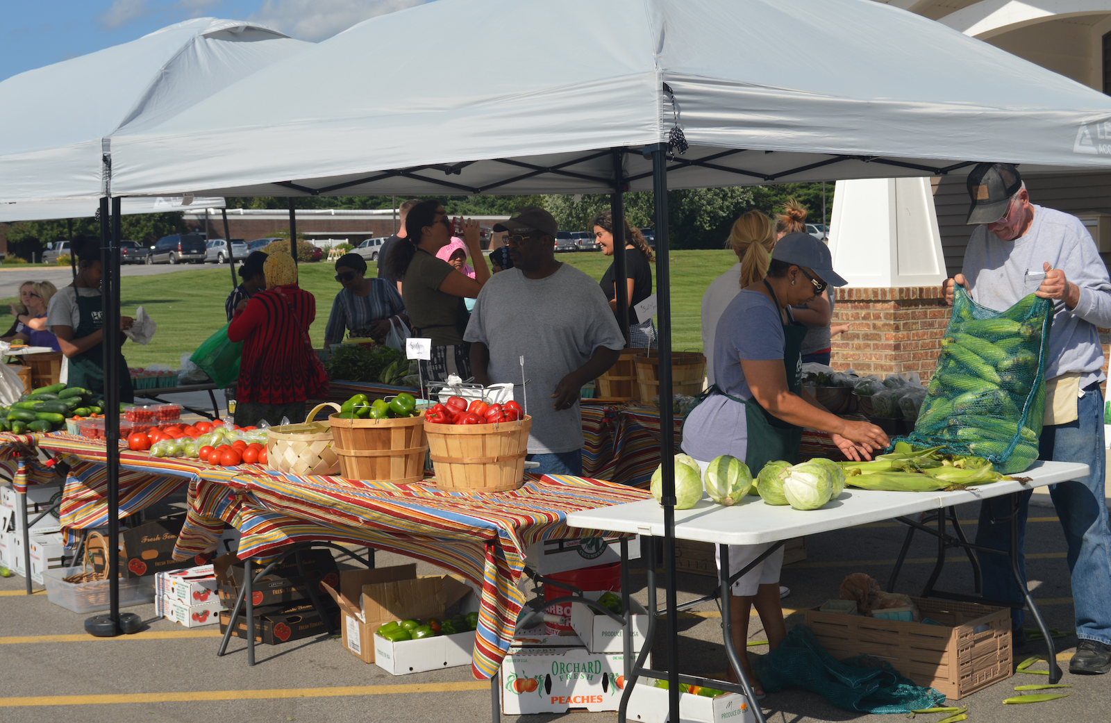 A HEAL Market sells food from Parkview Community Greenhouse & Learning Kitchen in 2019.