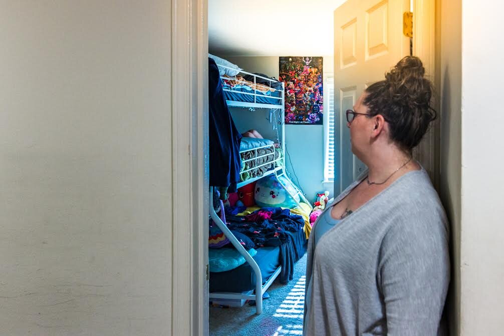 Angela Skelton and her three children rent a three-bedroom apartment at Archer’s Pointe, which they share with her boyfriend, who has two children of his own.