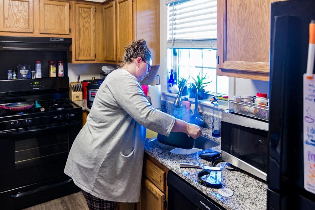 Angela Skelton and her three children rent a three-bedroom apartment at Archer’s Pointe, which they share with her boyfriend, who has two children of his own.