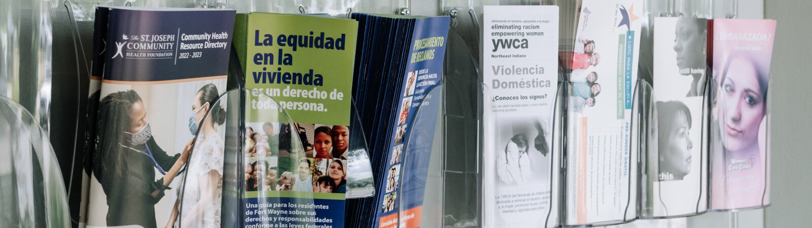 Multilingual information guides in the entryway at Amani Family Services in Fort Wayne.