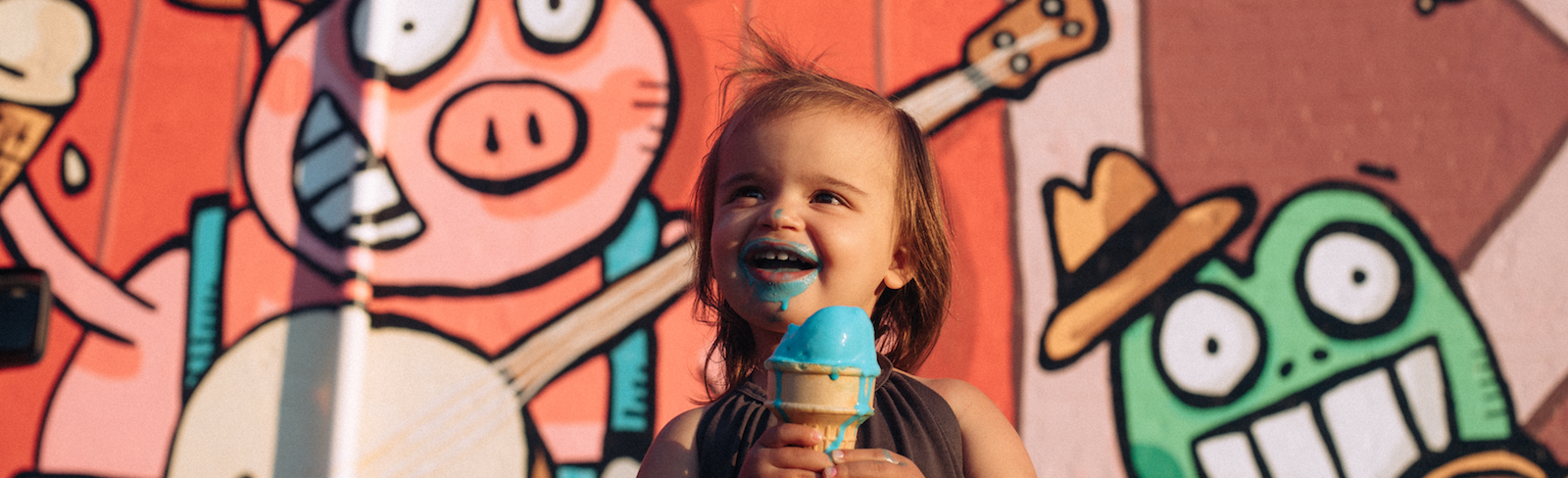 The Ice Cream Vault on Main Street in Andrews, Ind., features a mural of a Farmyard Hoedown by Bryan Ballinger.