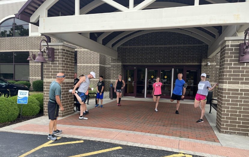 Members of the Wabash River Run Club prepare for a run.