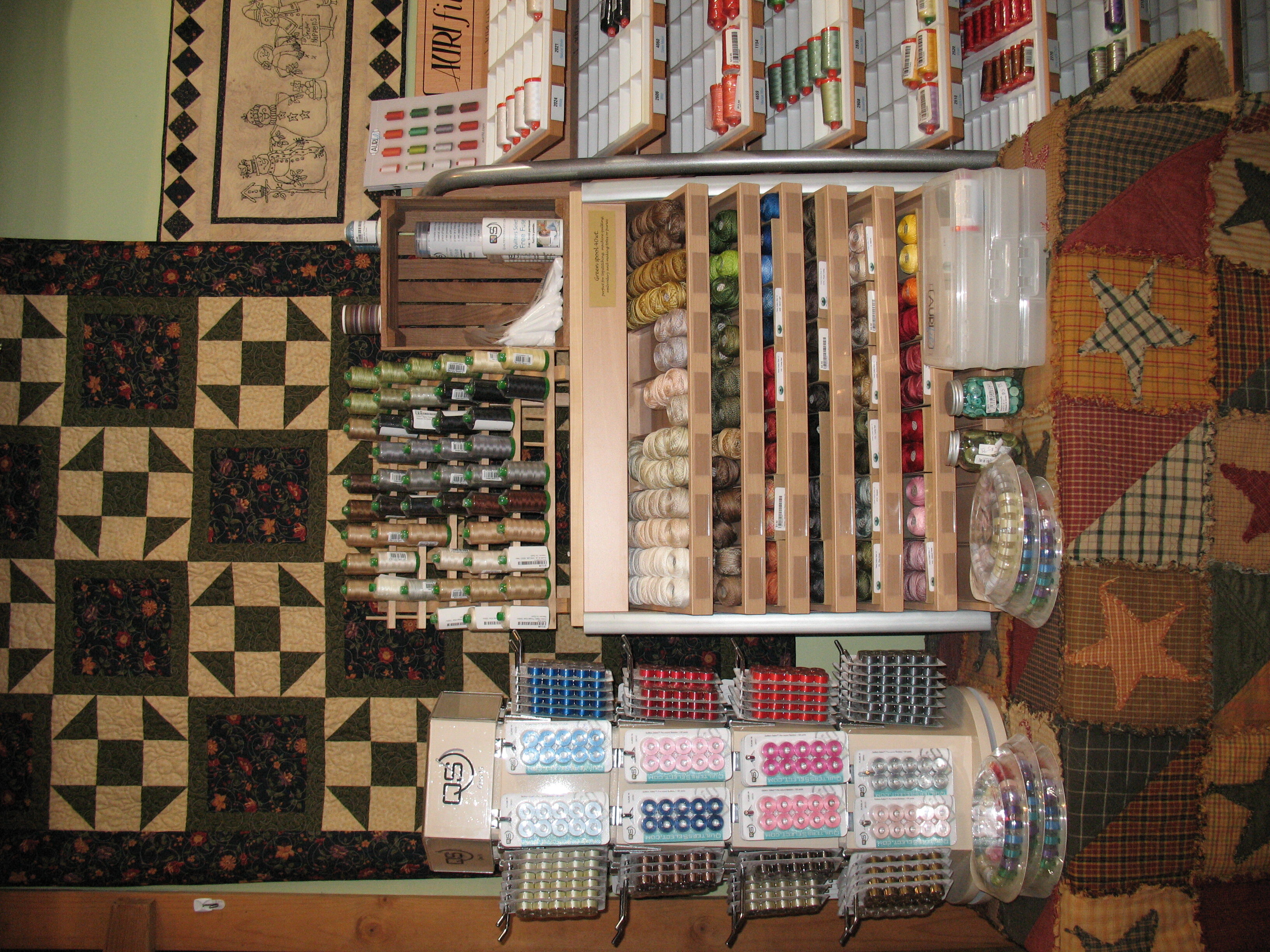 Threads and bobbins displayed at Heaven on Earth.