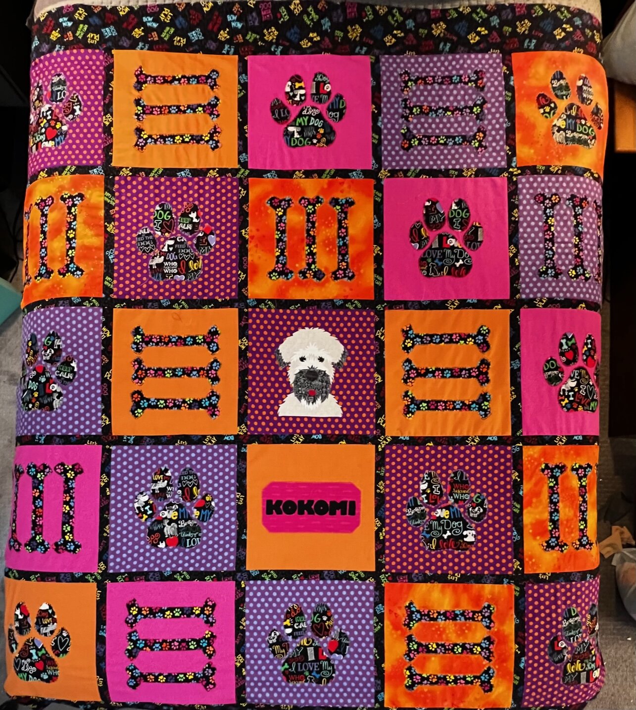 A quilt made by Diane Morris, which was gifted to her niece, to celebrate her dog. 