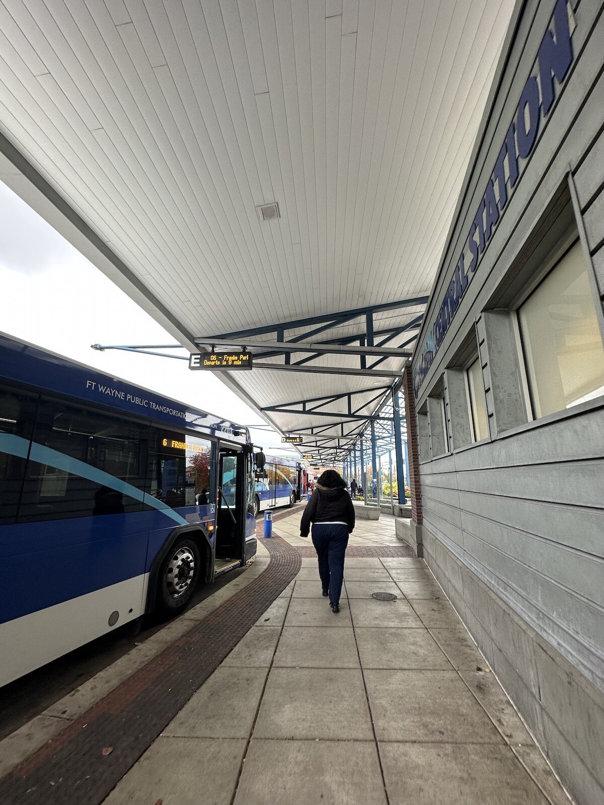 A rider makes their way to their bus at Central Station, Downtown Fort Wayne.