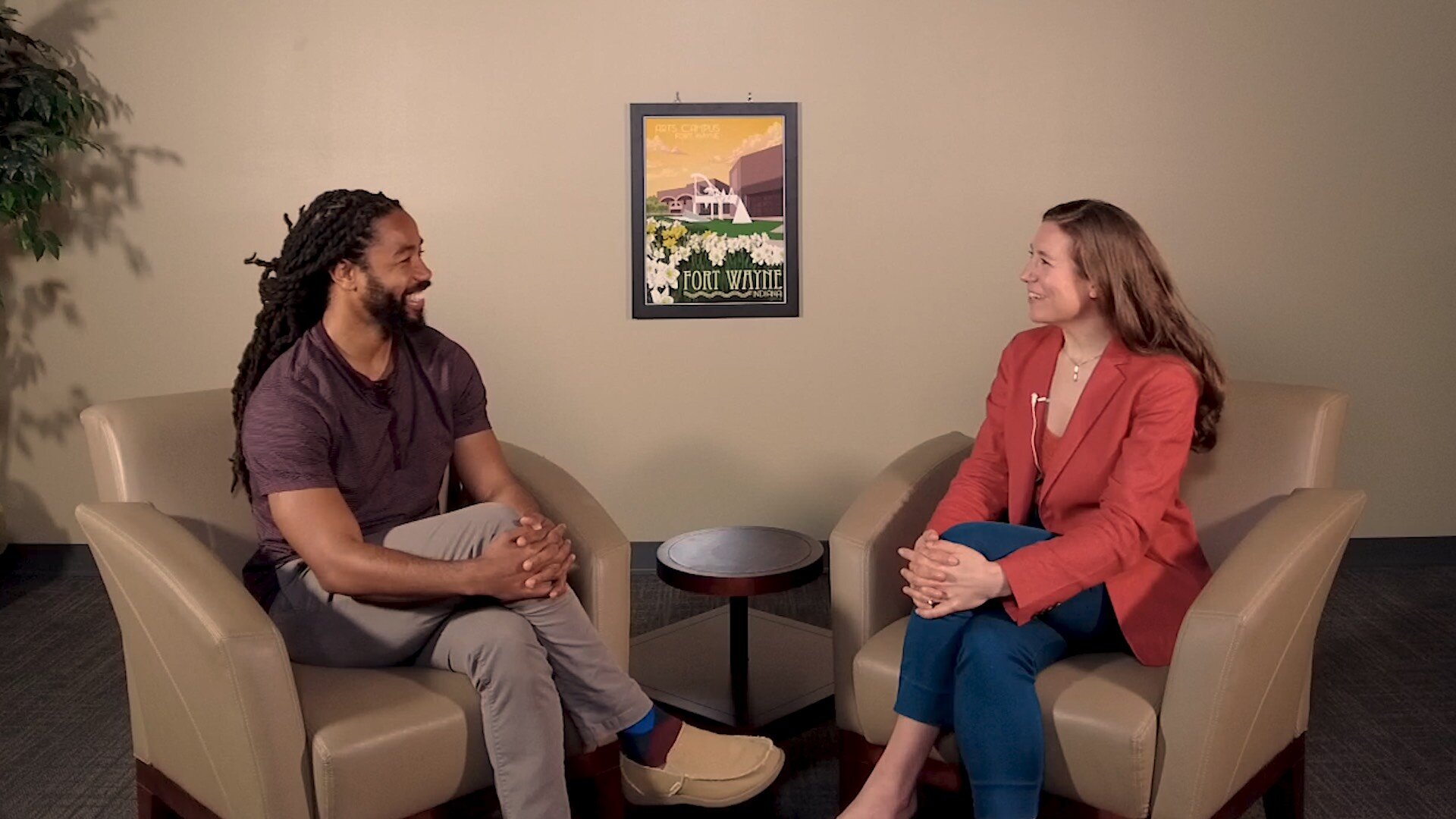 Arts United President Susan Mendenhall (right) talks with Adrian Curry about the significance of Juneteenth.