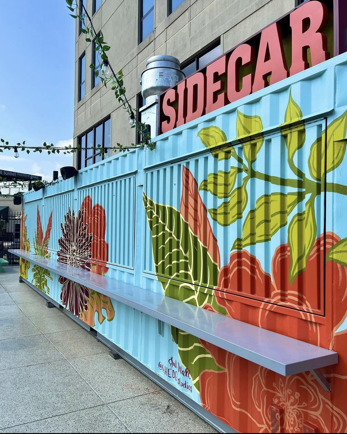 Local artist Julie Wall of The Hedge Studios has completed an Art This Way mural installation at the Sidecar.