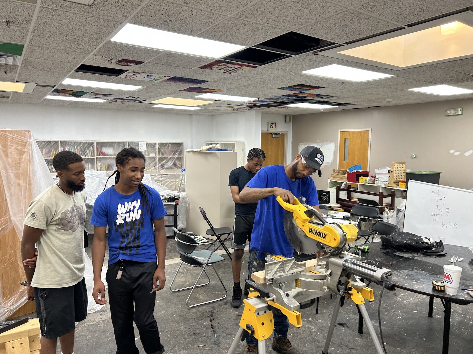 Johnson's on-the-job apprenticeship model teaches participants the skills needed to secure jobs in carpentry and other trades.