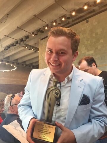 Gavin Thomas Drew with his Anthony Award for Outstanding Supporting Male Performance as Igor in "Young Frankenstein." 