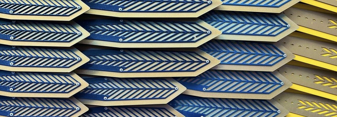 Feathers, which have been laser cut with with symbols borrowed from Ukrainian folk embroidery, in Art This Way's latest installation Downtown Fort Wayne.