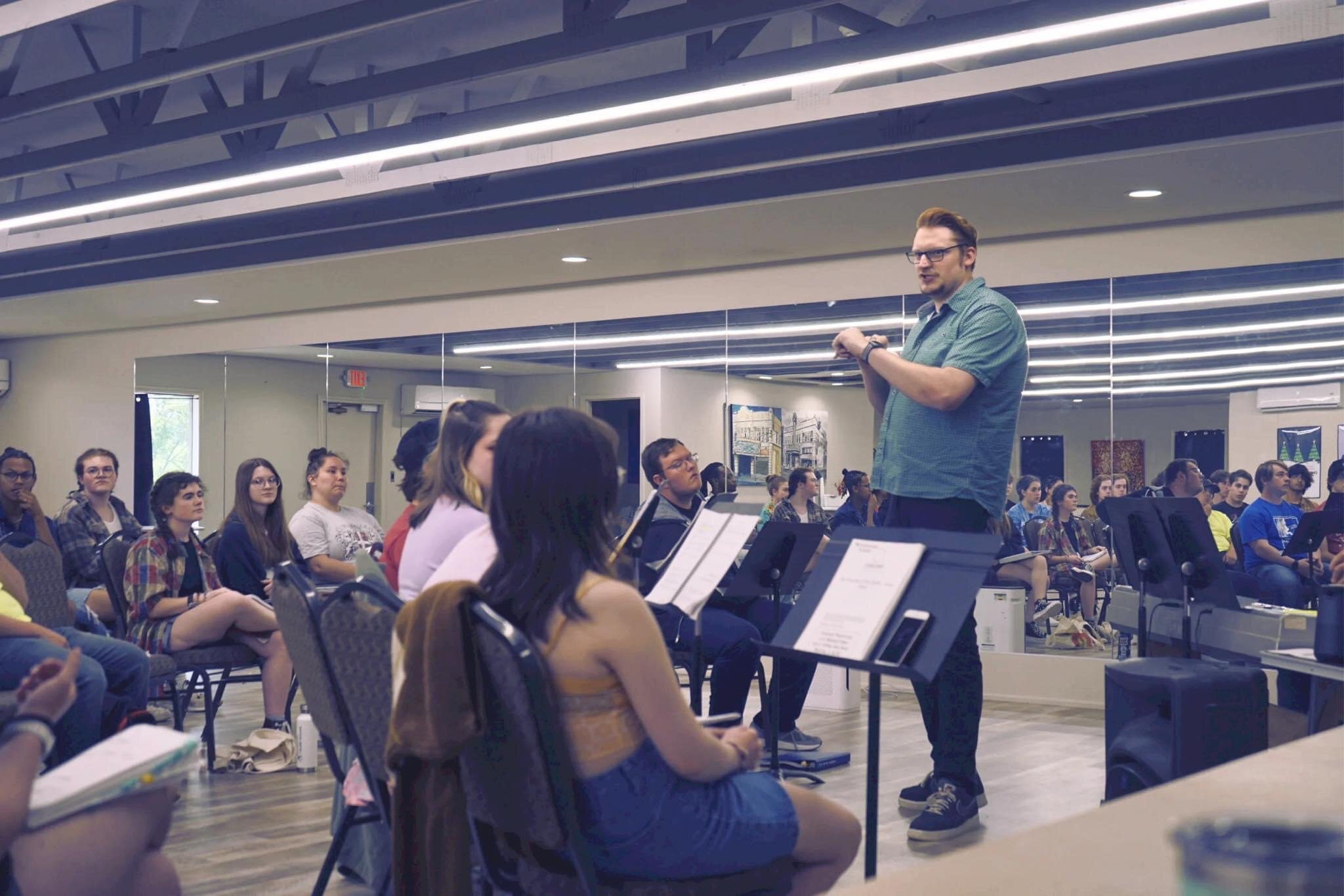 Andrew Sherman gives directions at a rehearsal. 