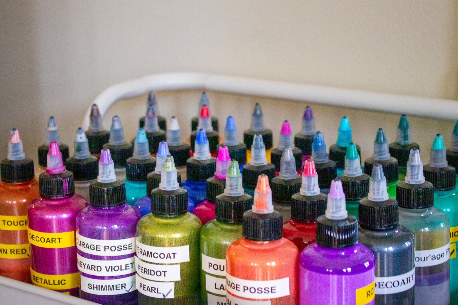 Paints used to create drip painting at Indigo Studio.