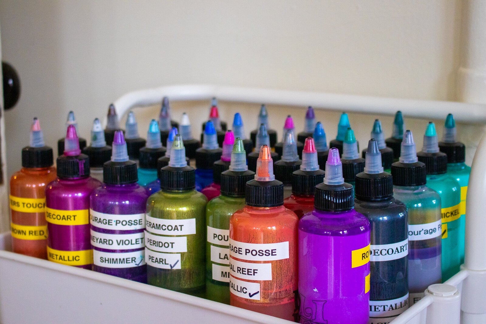 Paints used to create drip painting at Indigo Studio.