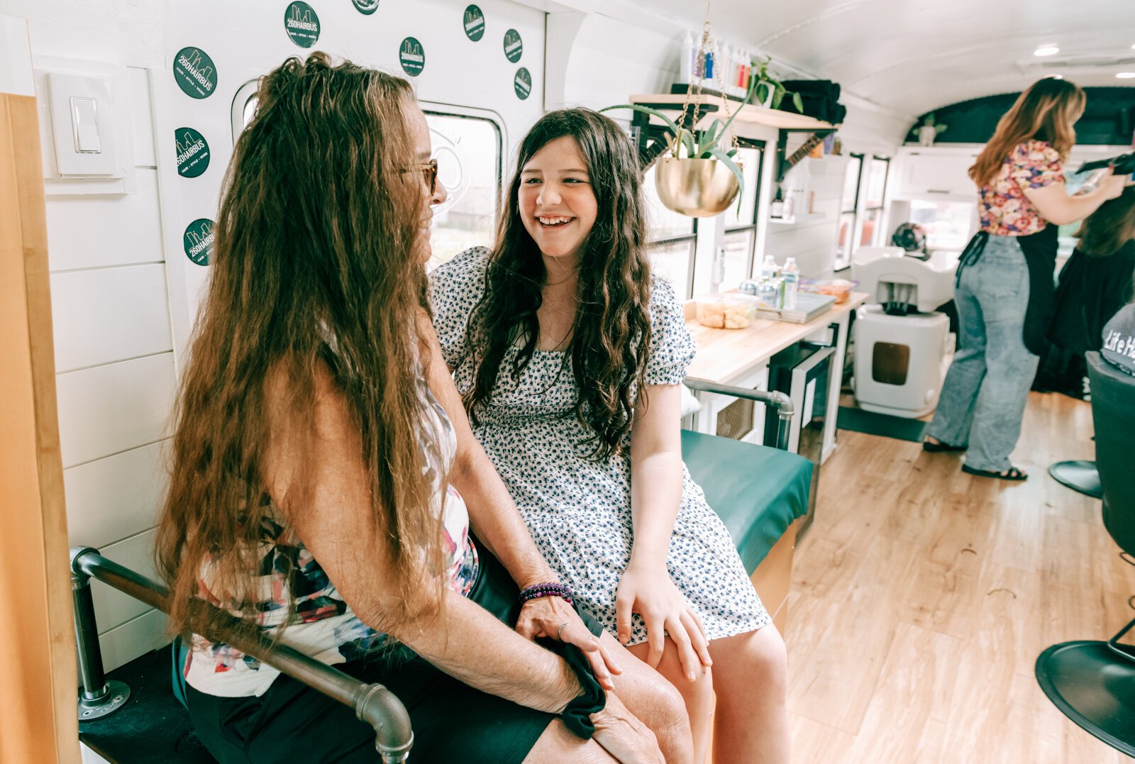 Cindie Shaleen, left, and granddaughter Lyla Oliver, 12, spend time together on the 260HairBus.