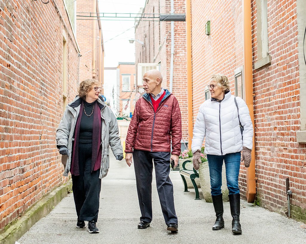 (Left to right) Jan Roland, Dave Haist, and Beverly Vanderpool walk through Downtown Wabash.