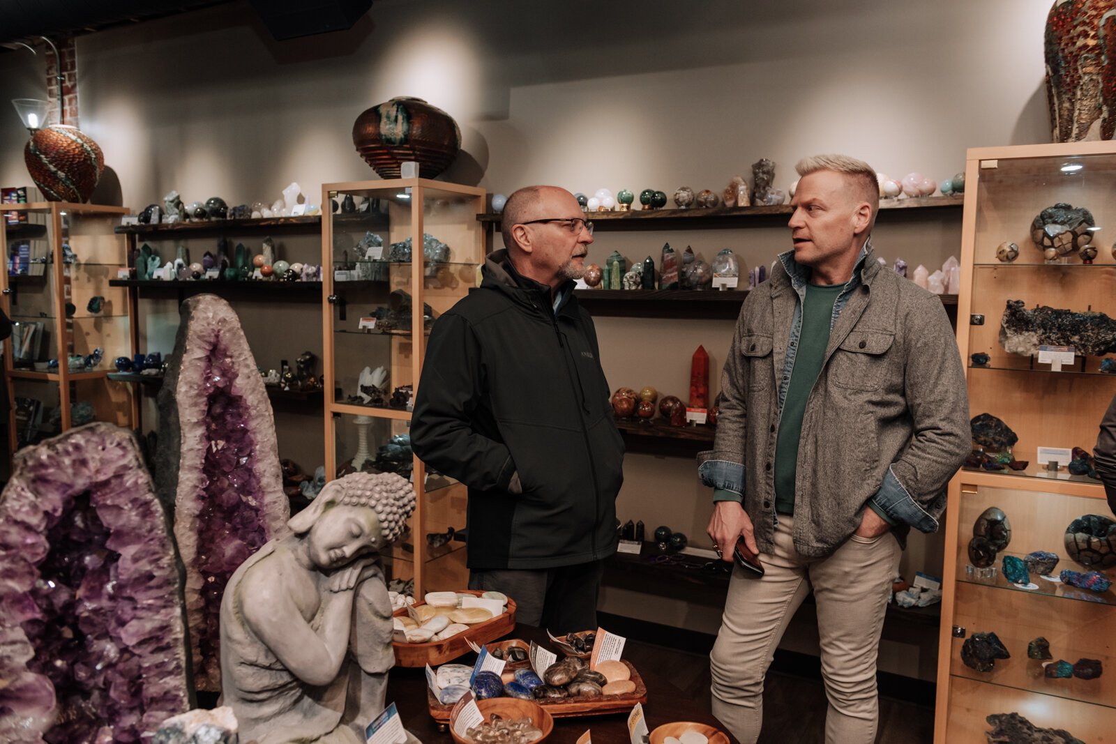 David Lee, right, talks with Jim Hoch, who was the architect of 2 Crazy Crystal Guys' new store at 4007 S Wayne Ave, Fort Wayne, IN.