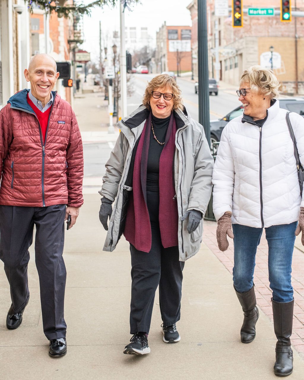Retirees (left to right) Dave Haist, Jan Roland, and Beverly Vanderpool walk through Downtown Wabash.