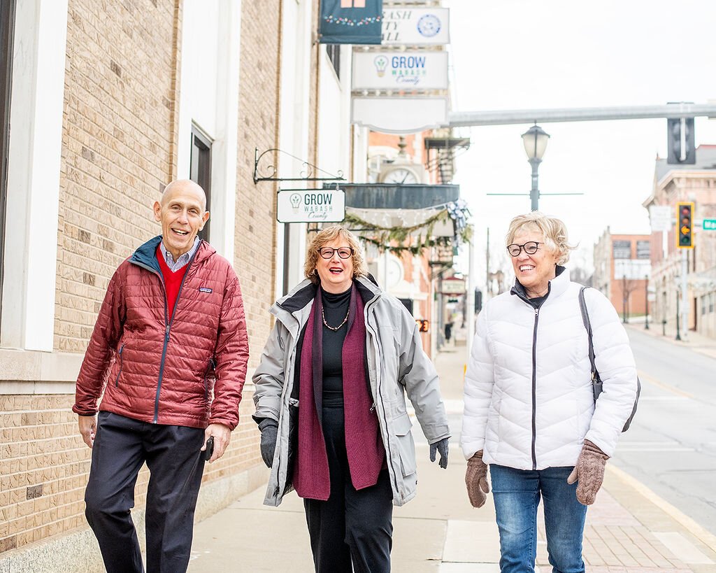 Retirees (left to right) Dave Haist, Jan Roland, and Beverly Vanderpool walk through Downtown Wabash.