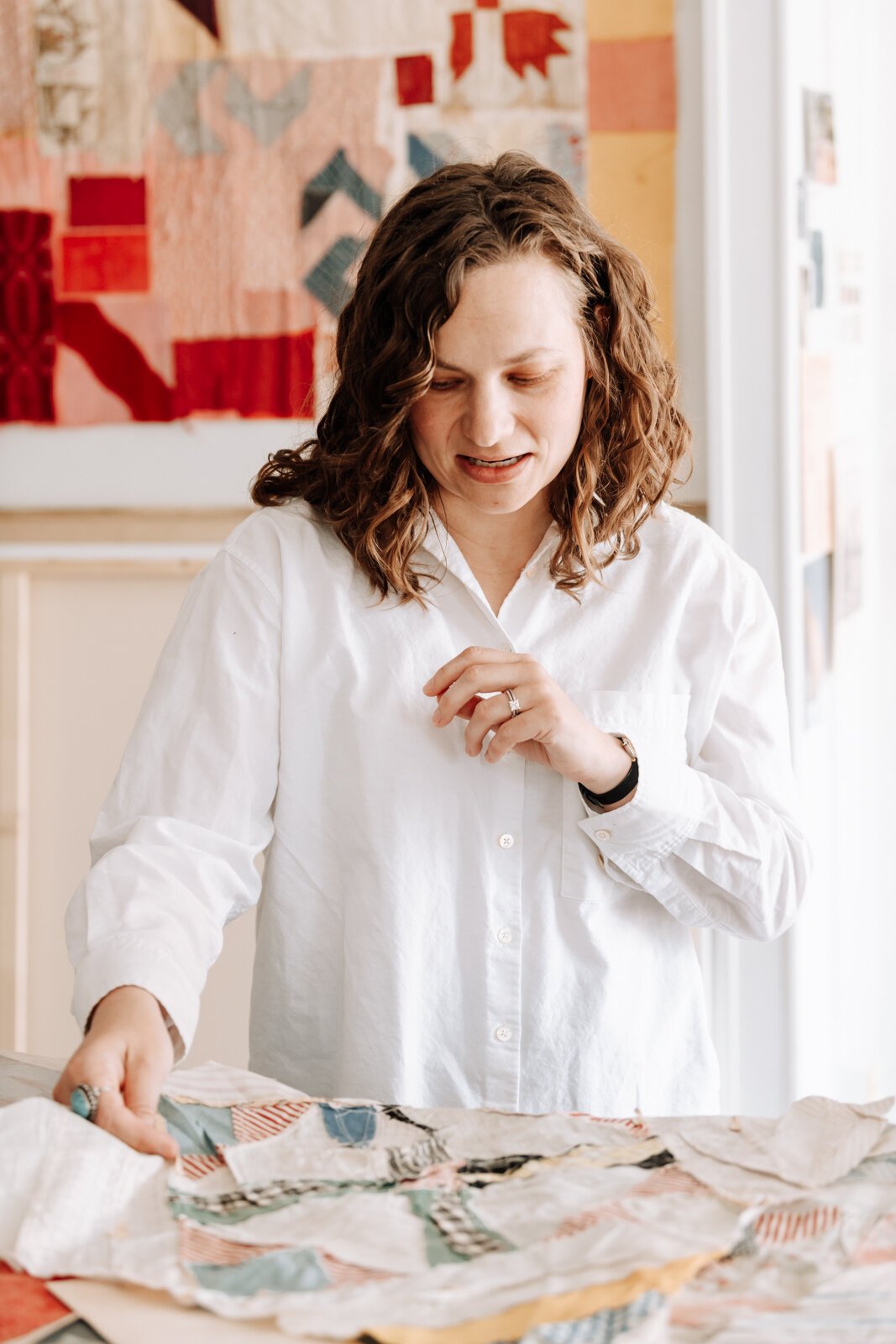 Dana Caldera in her studio space at Kinhouse Gallery.