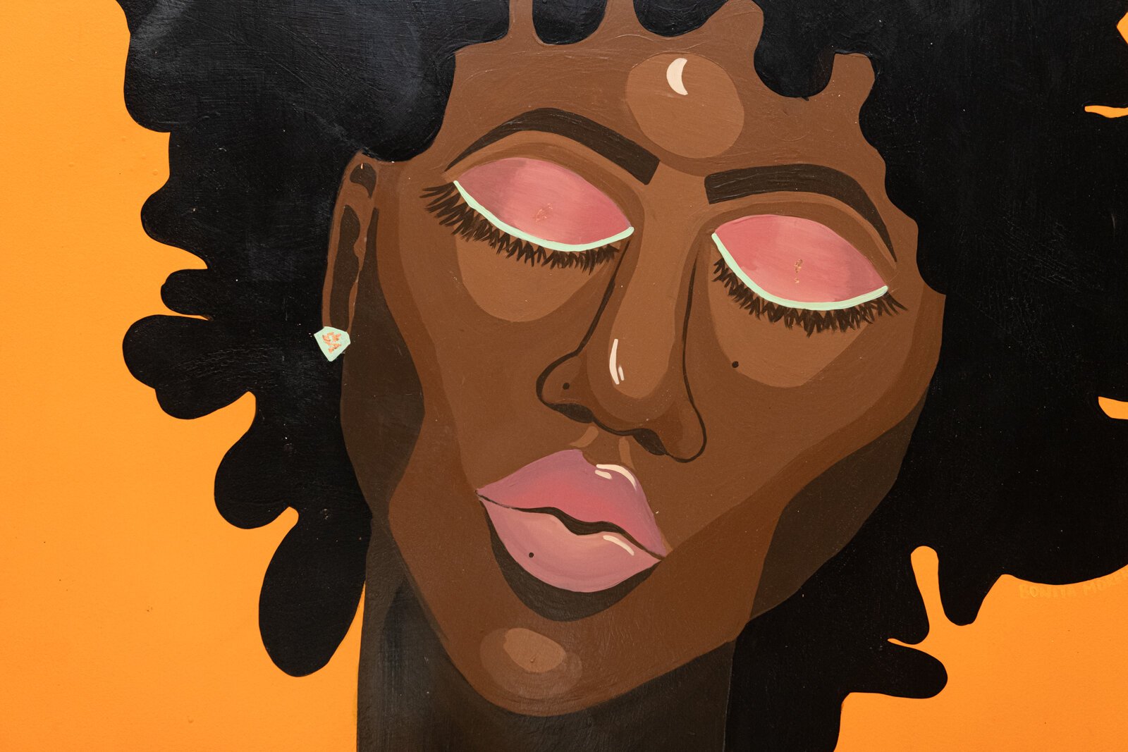 A close up of BonJo's piece "7 Dulce '' at Union Street Market at Electric Works, 1622 Broadway St. Fort Wayne, IN 46802.