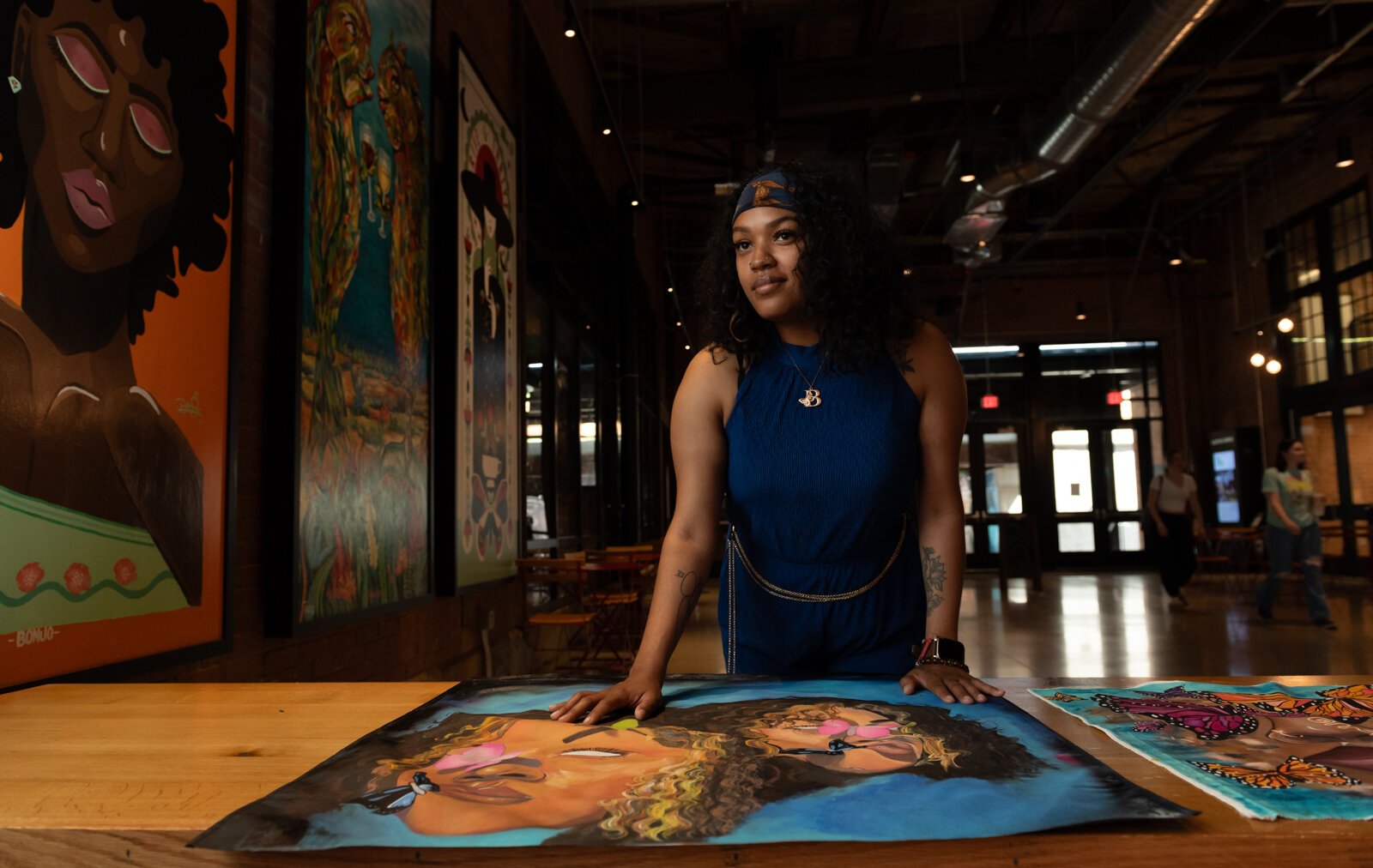 BonJo talks about her artwork at Union Street Market.